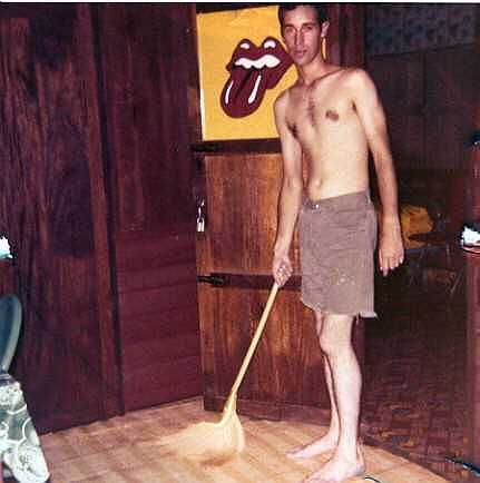 Me sweeping up the bungalow.